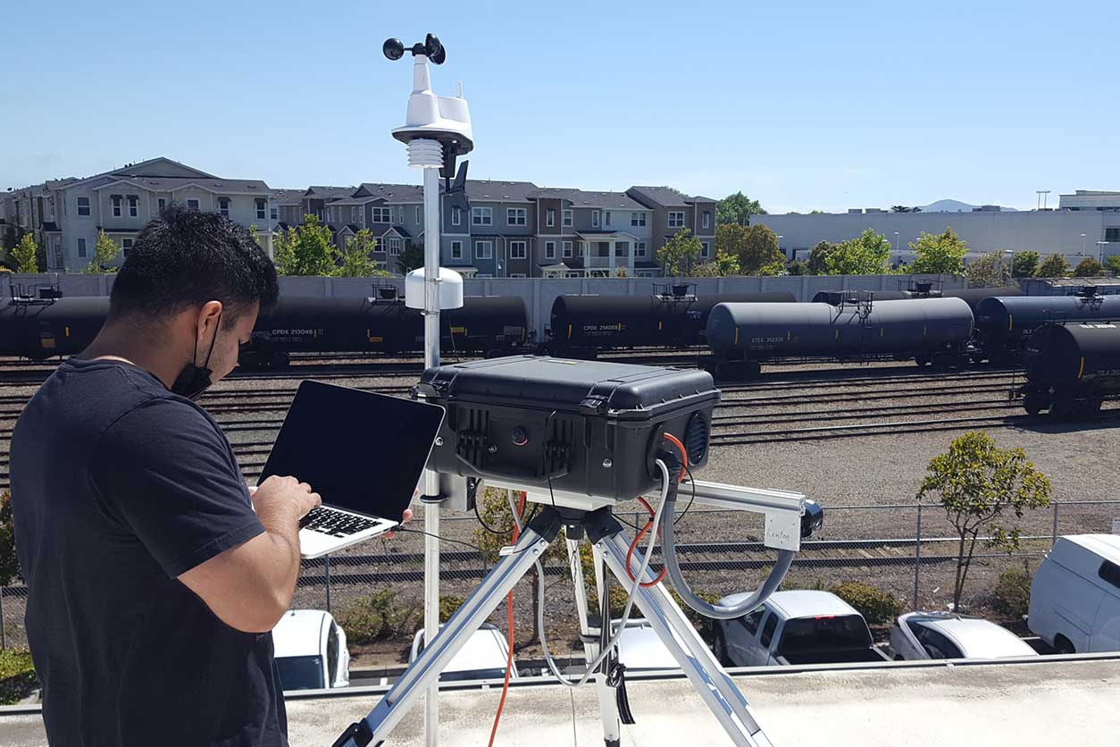 Dhawal Majithia checks the monitoring system that recorded activity from the coal trains before they were unloaded at the terminal.